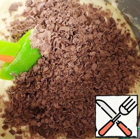 Add grated chocolate to the dough and mix well.