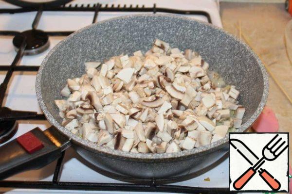 Add the mushrooms.