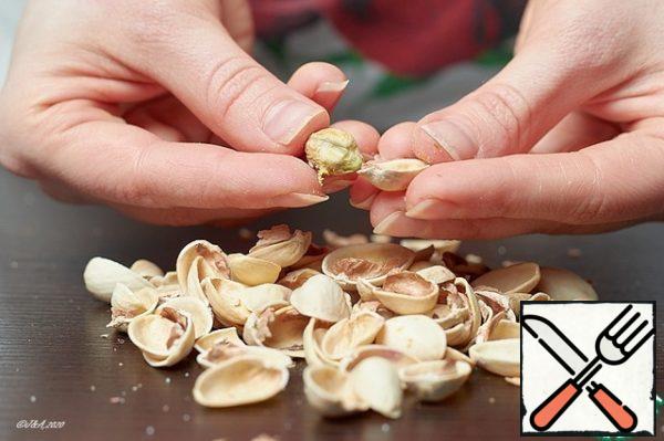 Peel the pistachios.