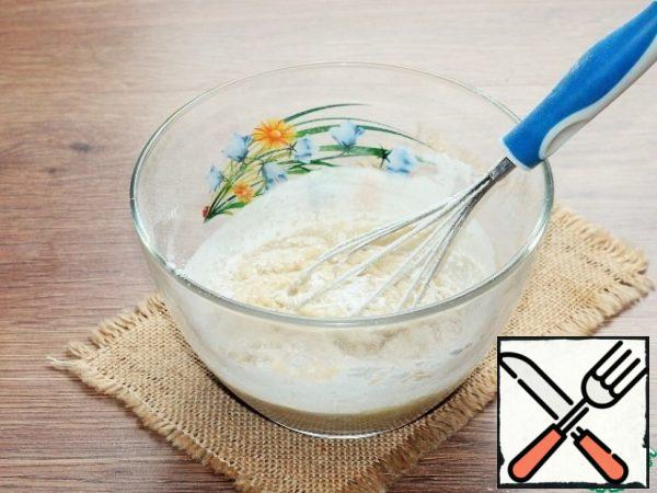 Knead the dough with a whisk.