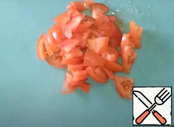 Tomatoes cut small pieces;