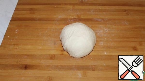Knead a smooth homogeneous dough without adding flour.