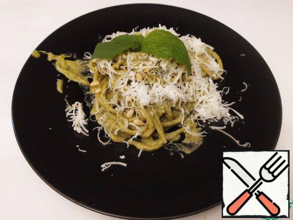 Then immediately serve to the table.

For decoration, you can sprinkle with parmesan, whole pine nuts and put some greens.