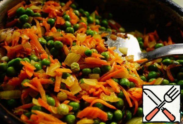 Fry until the peas are defrosted