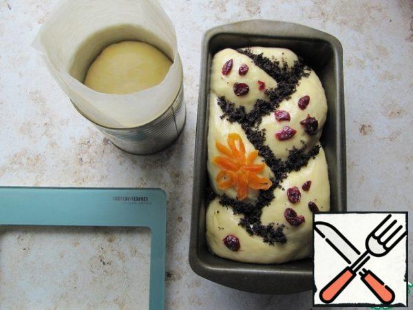 Grease the top of the cake with yolk, decorate to your liking.
Put the remaining piece of dough in a baking dish.
Send the dough to proofing for about an hour (until the dough increases by 2 times).
Bake in a preheated 180°C oven until ready (onion dryness test).