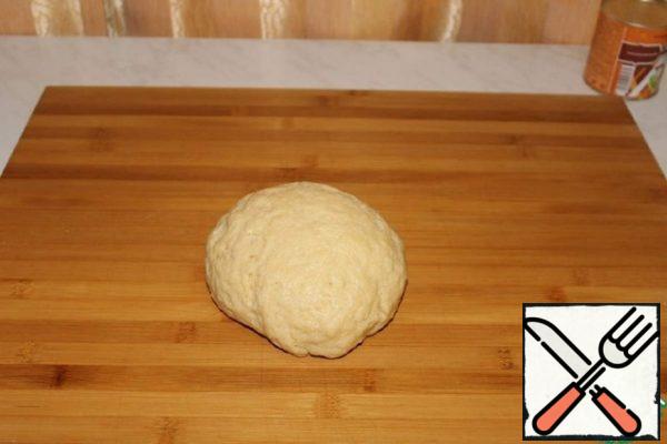 Knead the soft dough.