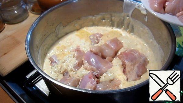 Lay out the chicken and let it simmer for 40-50 minutes over medium heat.