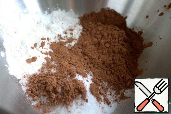 Measure flour, cocoa, sugar.