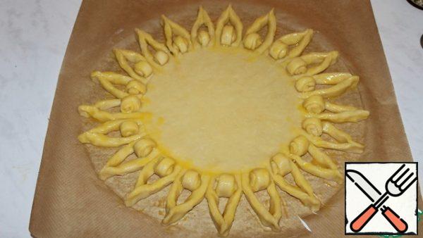 Lubricate the petals with yolk.