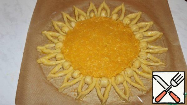 Put the orange filling in the middle.