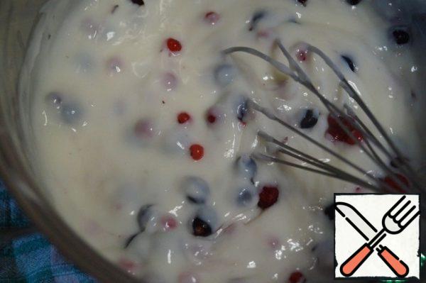 Remove from the heat and add the berries to the hot mass. Stir.