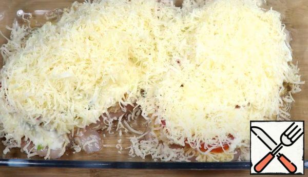 Sprinkle all over with finely grated cheese.