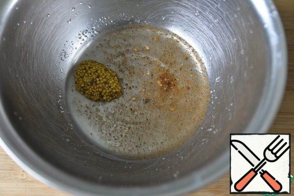 Prepare the marinade: mix vinegar, salt, sugar, pepper mixture and mustard.