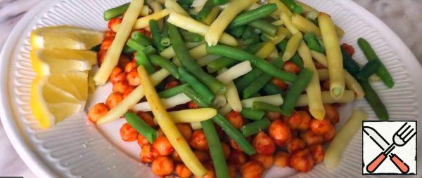 Add salt and lemon juice to the beans.