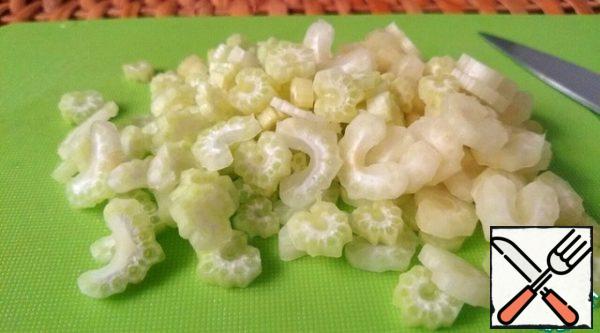Celery is also cut into thin slices.