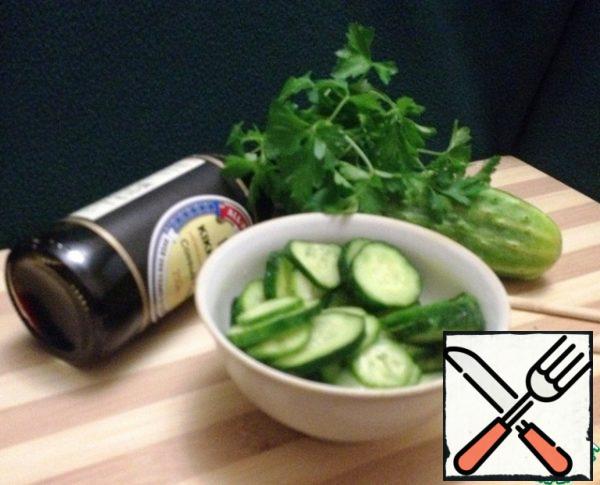 Pour the dressing over the prepared cucumbers. Stir.