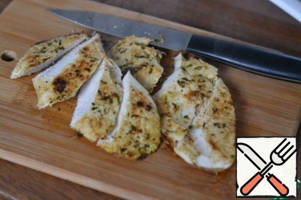 The finished fillet is spread on a Board and cut into strips.