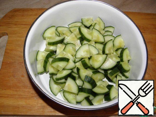 Slice the cucumbers.