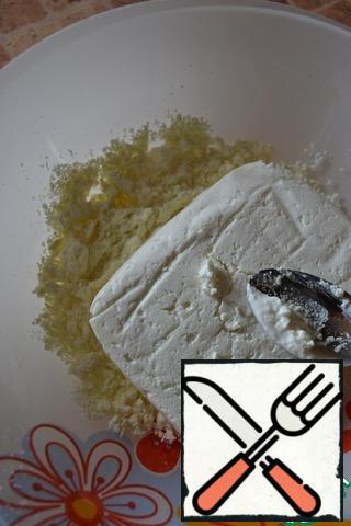 Mix the vanilla, 20 g of coconut chips, milk powder and cottage cheese.