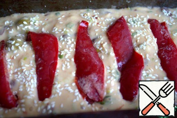 Add the bell pepper slices and sprinkle with sesame seeds.
