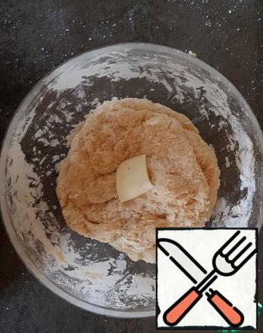Gradually add pieces of butter. Knead dough. Knead for 10-15 minutes. Leave to rise in a warm place for 2.5 hours. After an hour, knead the dough.
