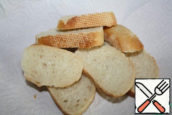 Baguette or bun cut into large rings, if you have a flatbread, then break into large pieces.