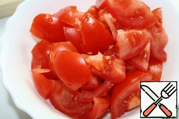 Slice the tomatoes.