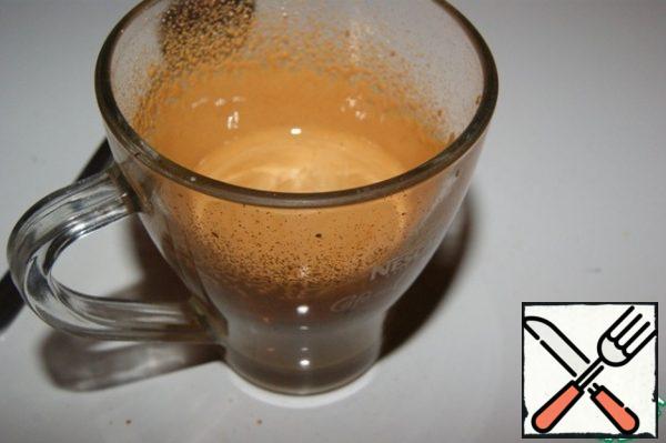 Beat coffee, sugar and boiling water with a mixer or blender into a thick white foam.