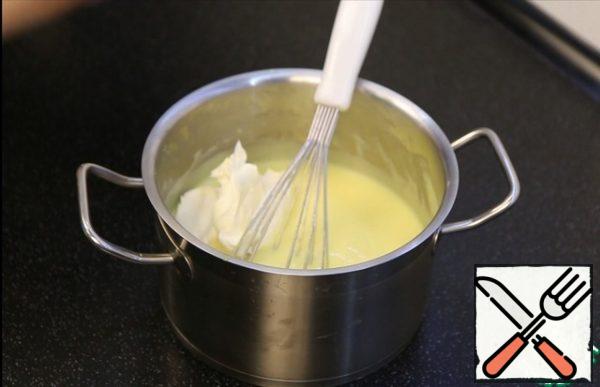 Softened or whipped butter. It doesn't matter, it will dissolve anyway. Stir.