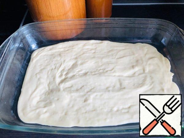 Transfer the dough to a baking dish (size 20 by 35), greased with oil.
- Put in a preheated 180*C oven for 15-20 minutes (check readiness with a toothpick).