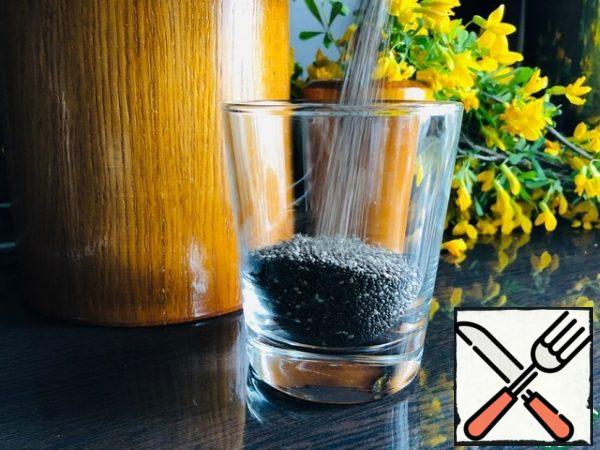 Pour the Chia seeds into a glass 2 tbsp.