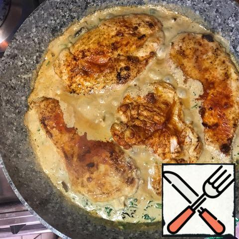 Return the chicken to the pan and simmer in the sauce until tender, turning the pieces periodically to wrap them in the sauce.