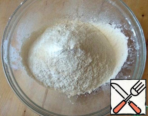 For the dough, sift the flour into a bowl.