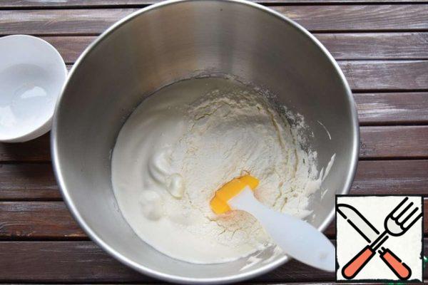 Mix the flour, corn starch and baking powder and sift through a fine sieve. Combine with the beaten egg mixture. Gently mix the dry ingredients with a silicone spatula.