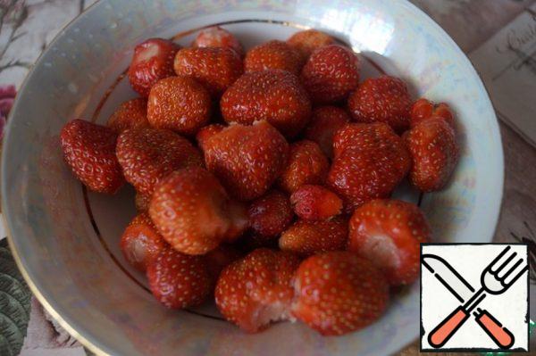 Wash the strawberries and remove the stalks.