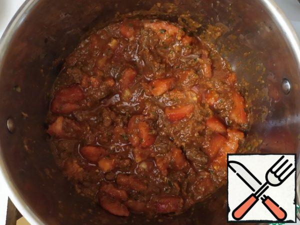 Onion with herbs, celery, tomatoes, salt, pepper. Stir and simmer for 30 minutes.