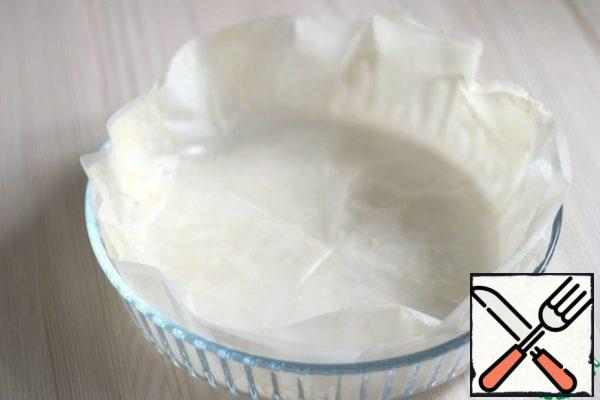 Put the sheets in a baking dish and send them to the refrigerator to cool the butter.