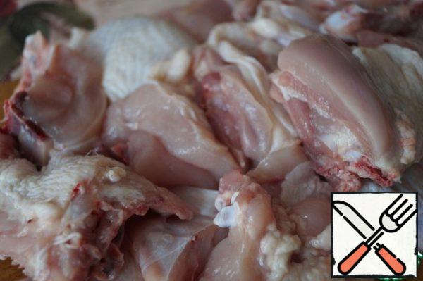 Wash the chicken carcass and cut into portions. Salt to taste.