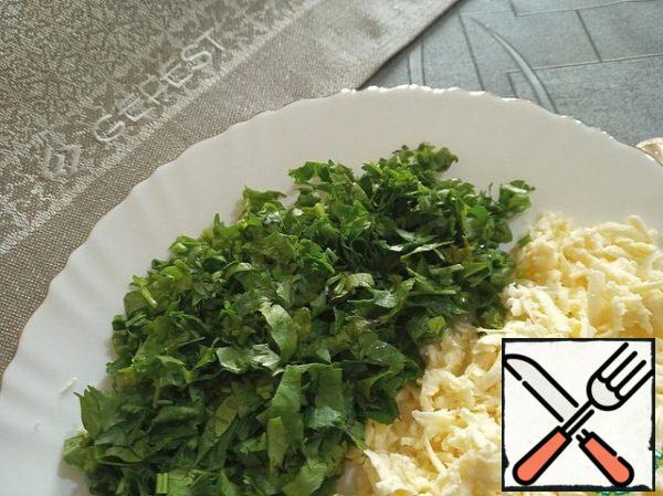 Cut the coriander, grate the cheese on a large grater.