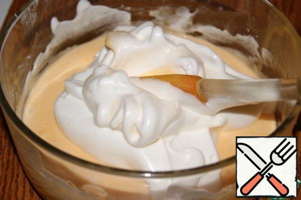Visually divide the remaining whipped whites into 2 parts. Add one to the light...