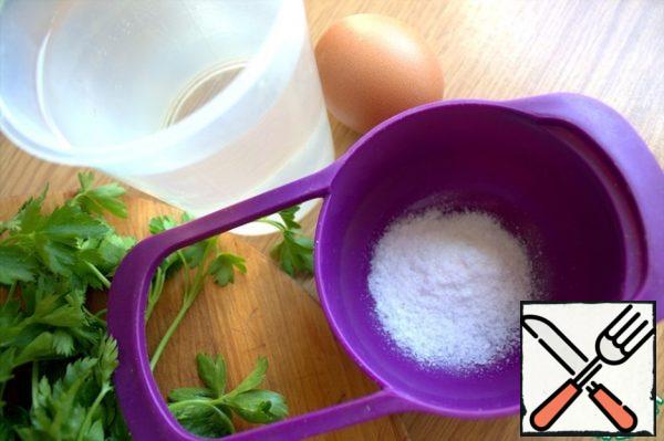 Measure warm water and salt. Stir the salt in a small amount of water.