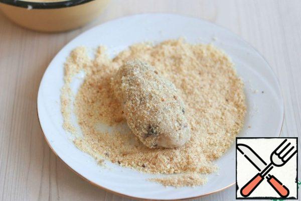 Form the cutlets with wet hands and pan them in breadcrumbs.