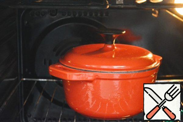 Cover the pan with a lid, put the soup in a hot oven and simmer for another half hour at 150-160°C.

I used a cast-iron enamel pot, but you can cook in a ceramic one. You can also pour the soup into serving pots and finish cooking in pots.