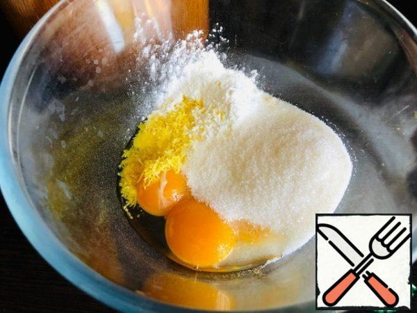 Prepare the cream - mousse:
- Mix the yolks, starch, sugar, and lemon zest with a whisk until light.