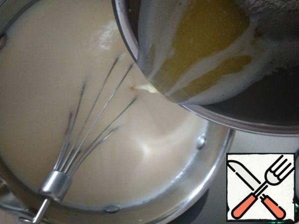 Melt the butter and add it to our mass without cooling down.