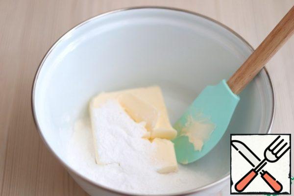 In a separate bowl, add the butter (180 gr.). add the powdered sugar (90 gr.). RUB the Mixture with a spatula until smooth and light.
