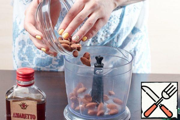 Put the almonds in a blender.