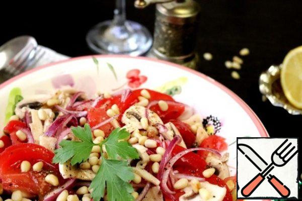 Sprinkle the salad with pine nuts and serve.
This is a very delicious and light salad!