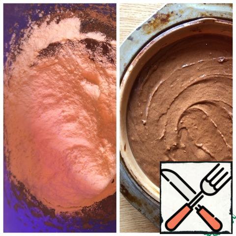 Add the baking powder and flour. Beat not long at all. The dough is dense, with a spoon does not flow. Put the dough in a form (22 cm) and send it to the oven at 180 g for 40 minutes. Use a dry wooden skewer.
