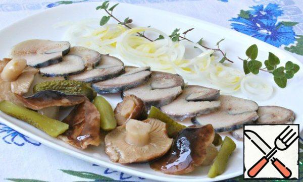 Served as part of an assortment-pickled gherkins, salted mushrooms, onions and lightly salted mackerel.